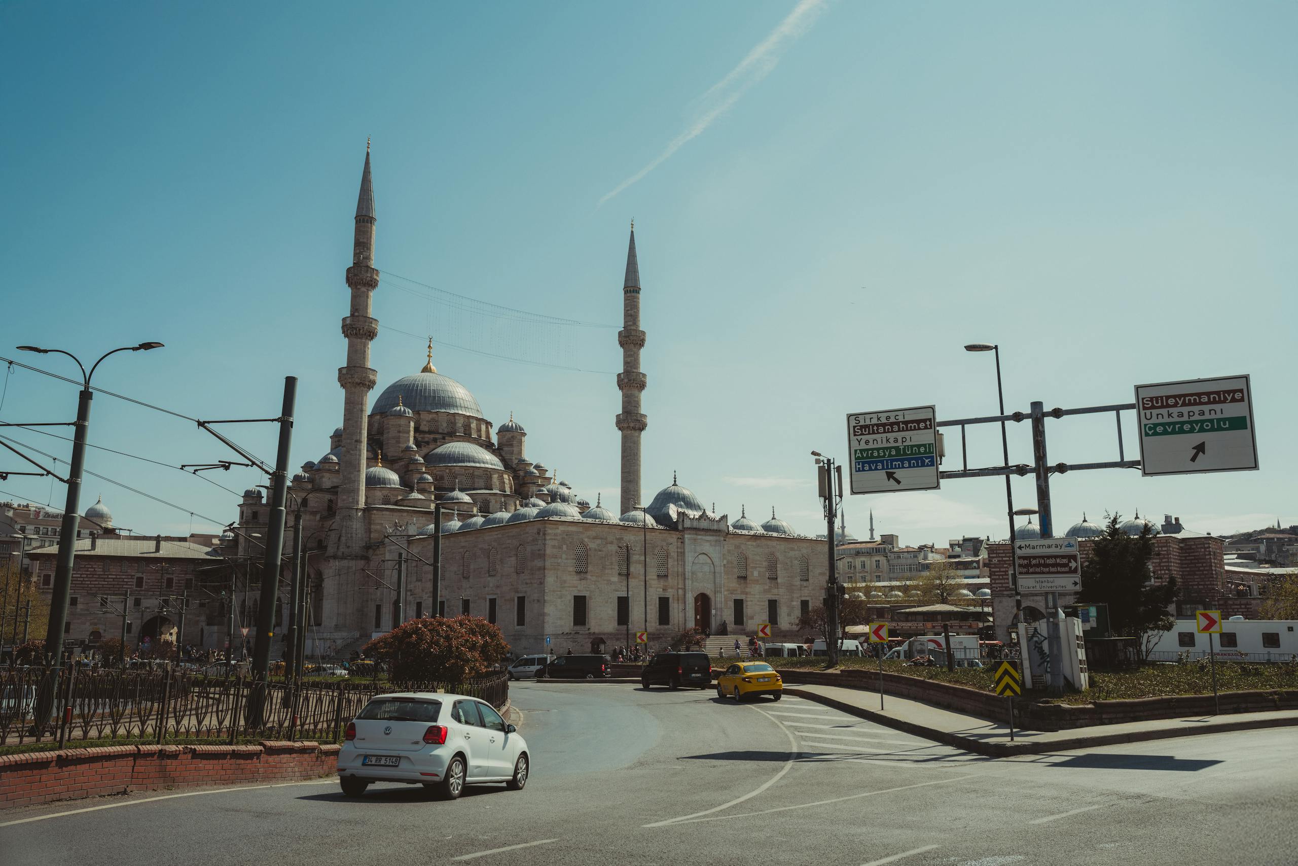 Captivating view of the New Mosque in Istanbul, Turkey with urban surroundings.